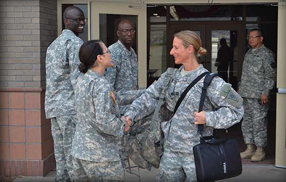 Command Sgt. Maj. Jane Baldwin (left), command sergeant major, 2206th Mobilization Support Battalion, bids farewell to Capt. Kimberly Snow, 324th Military Police Company commander.