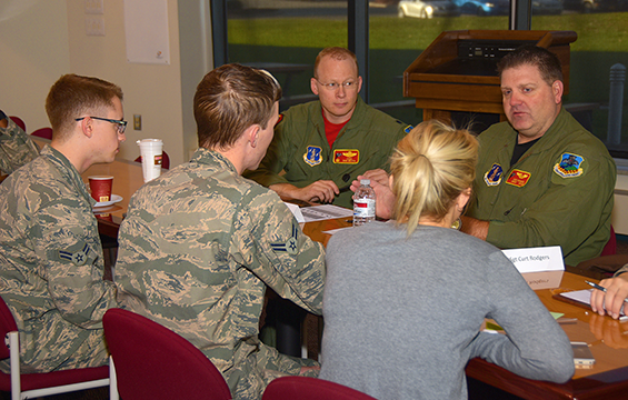 Chief Master Sgt. Curt Rodgers (right), of the 178th Operations Group, discusses issues with junior Airmen.