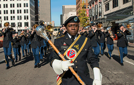 Sgt. William Thomas leads the 122nd Army Band during the Veterans Day parade.