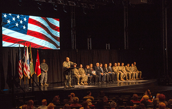 Maj. Gen. John C. Harris Jr., Ohio assistant adjutant general for Army, addresses the audience during the call to duty ceremony for the 323rd Military Police Company.
