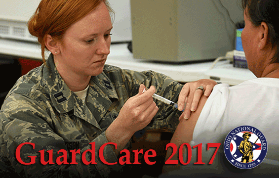 Ohio Air National Guard Capt. Sarah Woodson gives a patient an immunization.