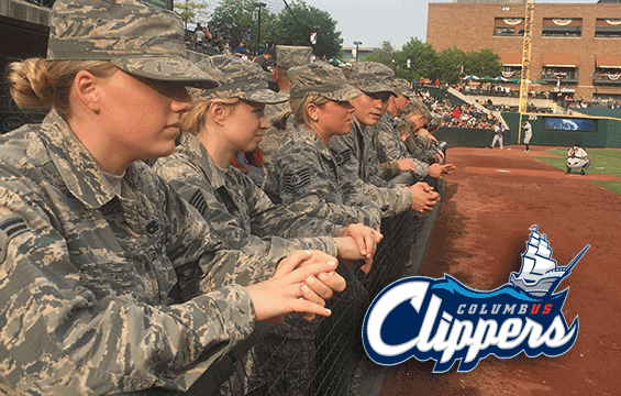Ohio National Guard members wait to exit the third base dugout at Huntington Park.
