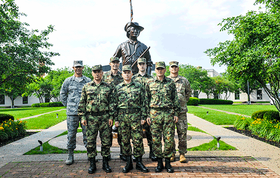 Brig. Gen. Gregory N. Schnulo (left), Ohio assistant adjutant general for Air, and Lt. Col. Matthew Woodruff (right), deputy J3-joint operations for the Ohio National Guard, stand with officers from the Serbian Air Force and Air Defense Command.
