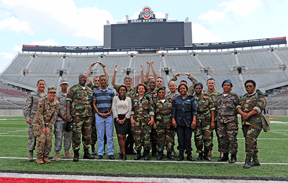 Members of the Serbian and Angolan Armed Forces tour Ohio Stadium with members of the Ohio National Guard .