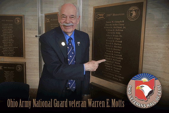 Warren Motts points to his name on the 2017 Honorees plaque
