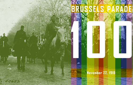 Historic photo of Soldiers on horses walking down street with color bar overlay.
