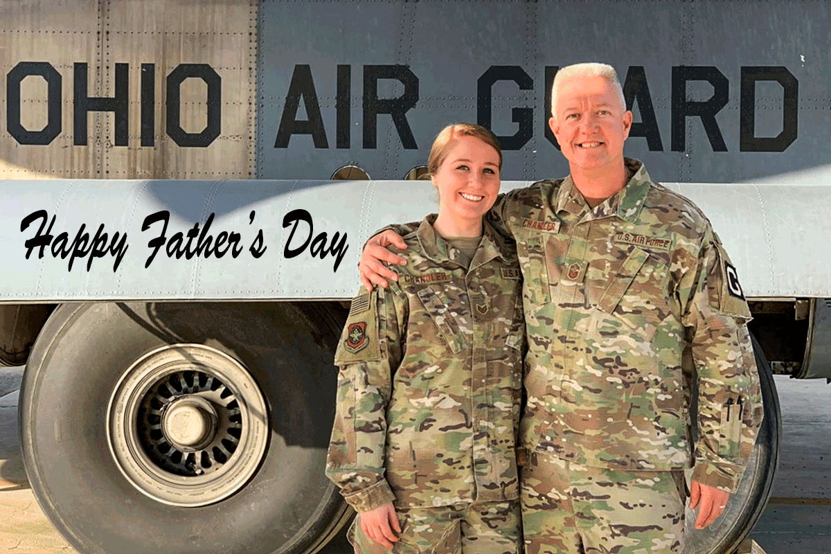 Chief Master Sgt. Ralph Chandler stands in front of an Ohio Air National Guard aircraft with his daughter, 