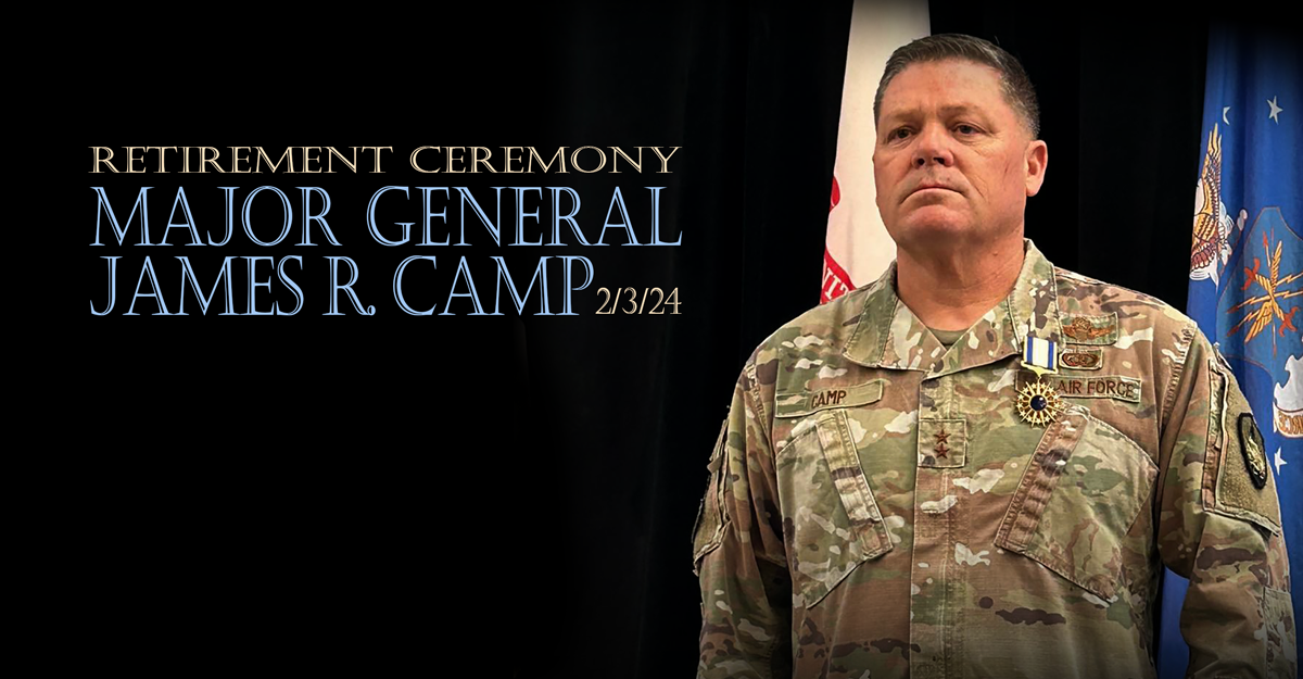 Major General James R. Camp stands at attention