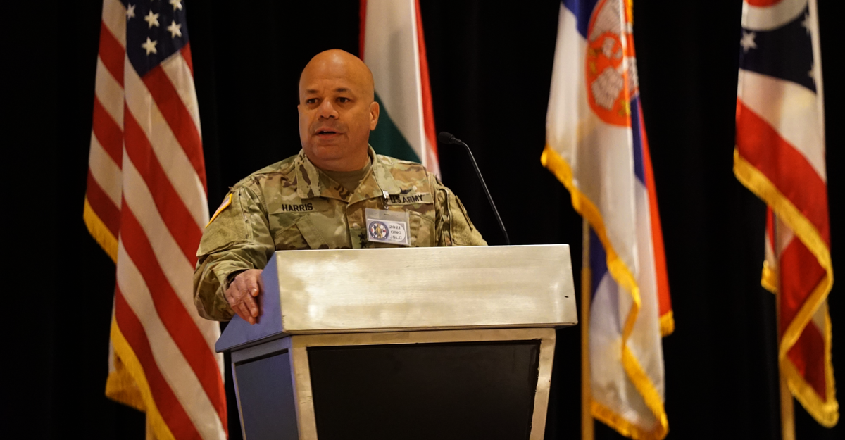 Maj. Gen. John C. Harris Jr. speaking from podium