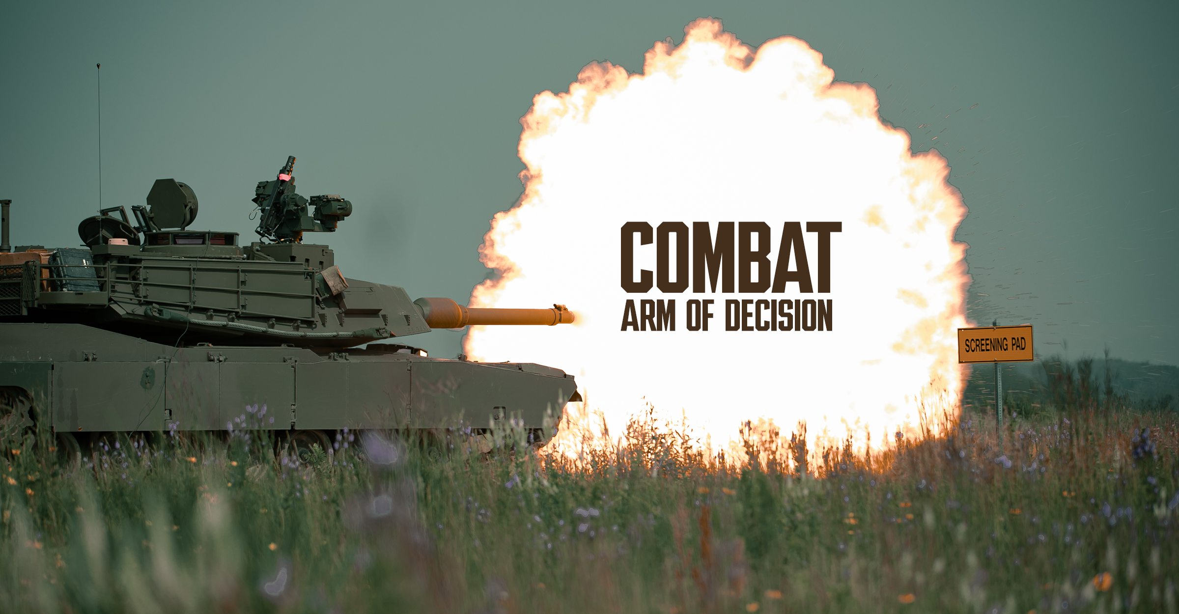 Tank firing in field.