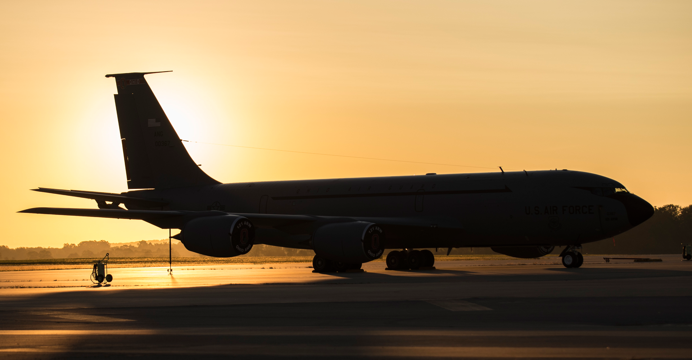 166TH AIR REFUELING SQUADRON: A KC-135 Stratotanker sits on the flight line at sunrise. A KC-135 crew and aircraft provide global, in-flight refueling support to U.S. and allied aircraft, extending their range and mission endurance. These squadrons are critical for rapid global mobility, also performing aeromedical evacuations and transporting cargo or passengers.