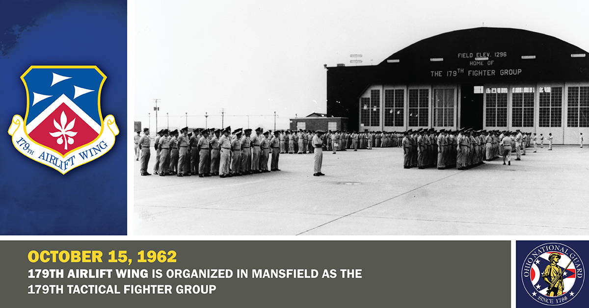 Personnel from the 179th Tactical Fighter Group stand in formation outside of their hangar.