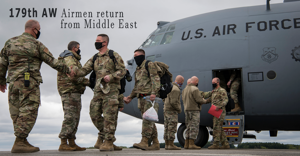 Airmen are greeted by fellow airmen as they dapart aircraft