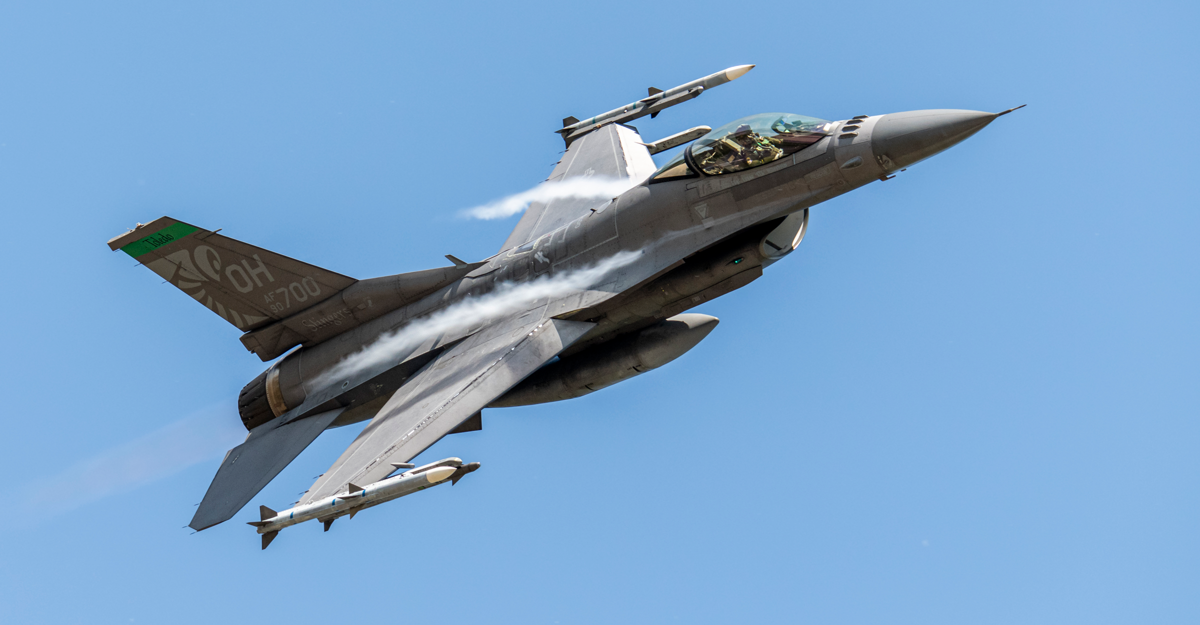 Air Force F-16 Fighting Falcon in sky.