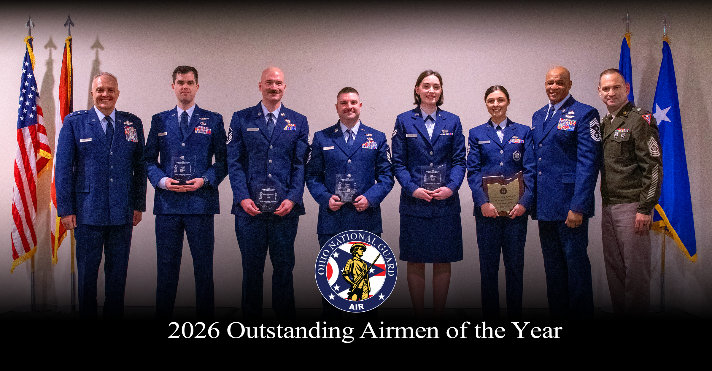 Group photo of Airmen holding awards