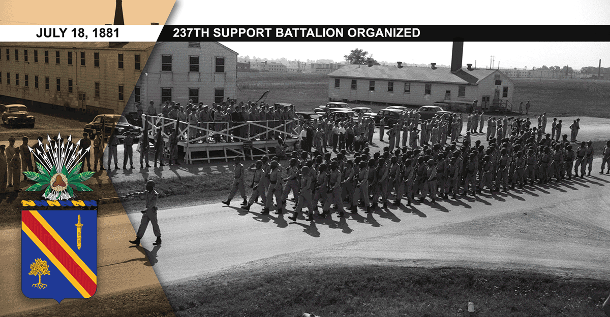 Company A, 372nd Infantry Battalion marches past the reviewing stand at Camp Atterbury, Ind., circa 1950