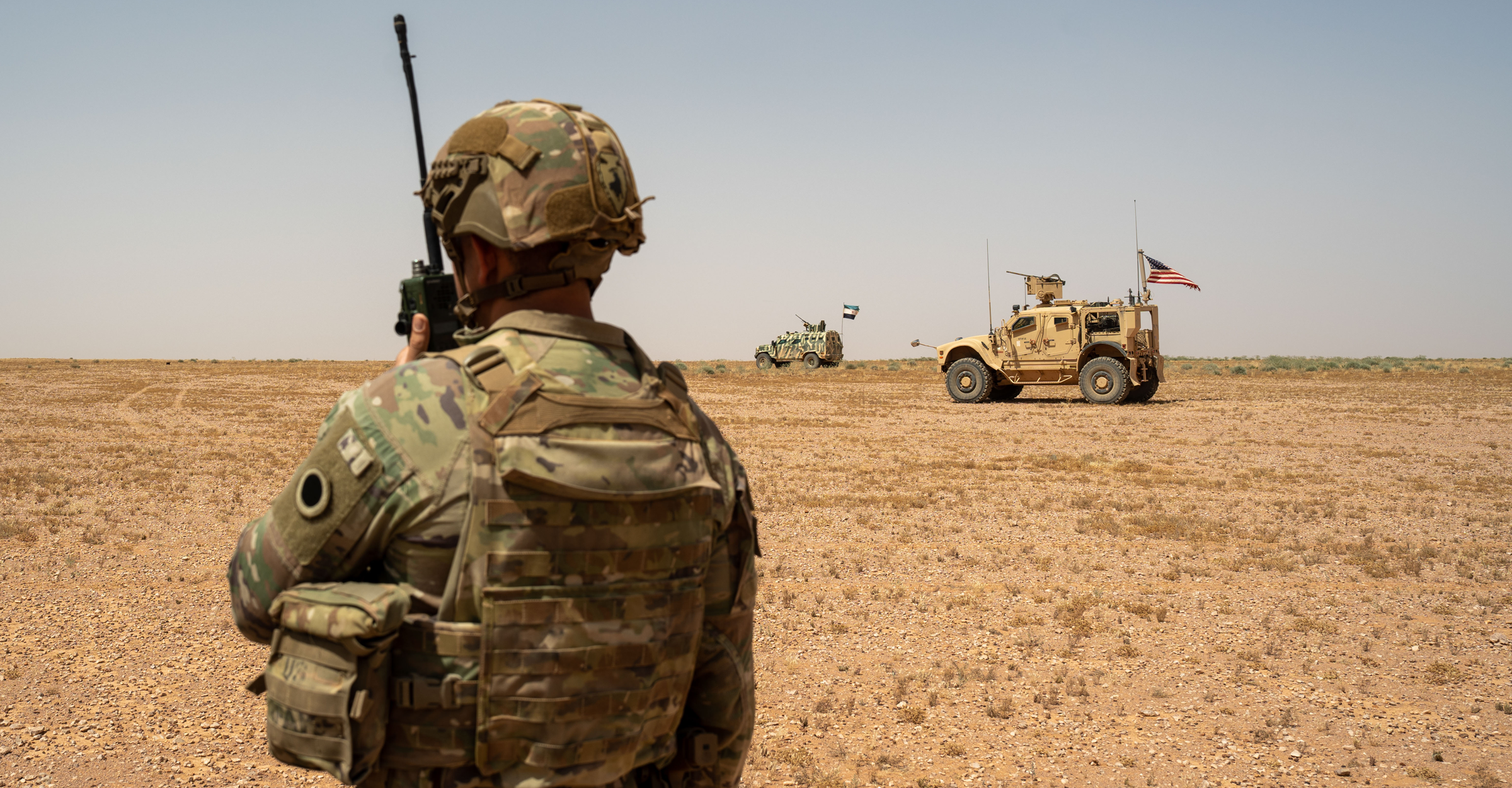The top of a F-16 Fighting Falcon flying