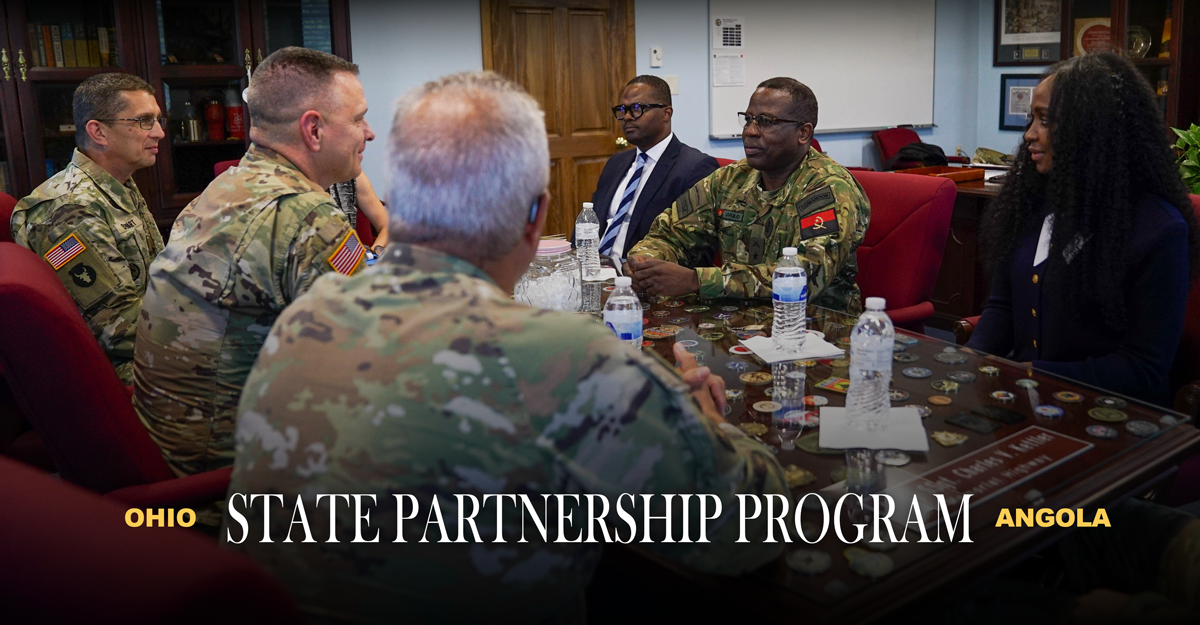 Ohio National Guard command team sits accross table from members from Embassy of the Republic of Angola