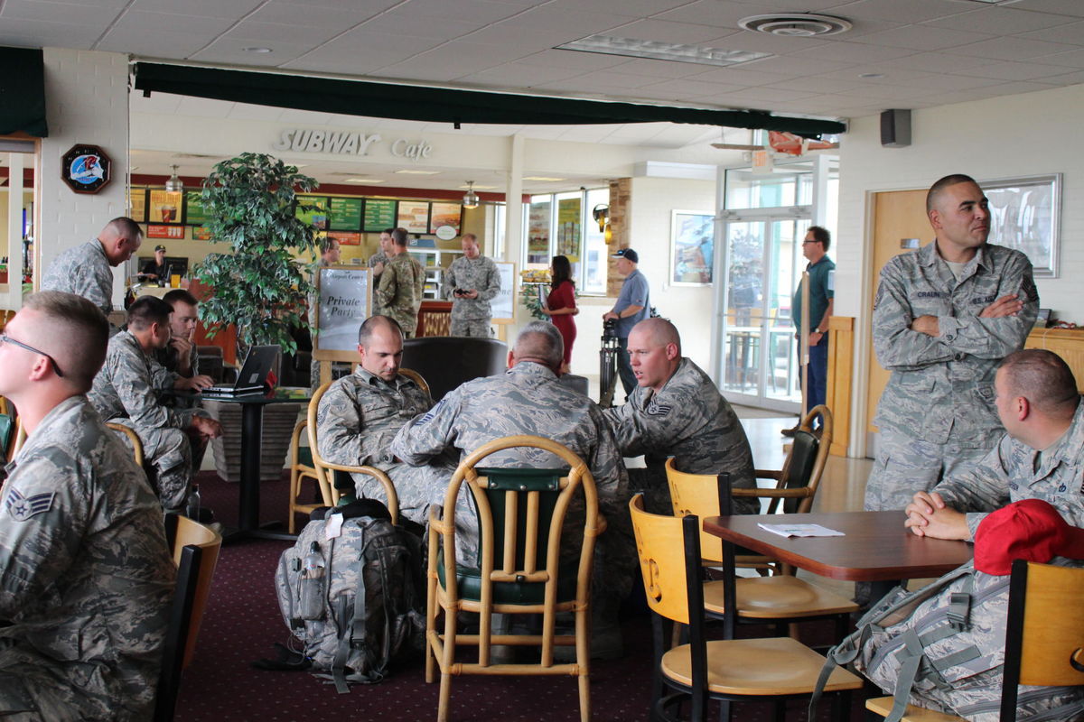The 200th RED HORSE Squadron awaiting departure in lobby aat Lahm Airport in Mansfield.