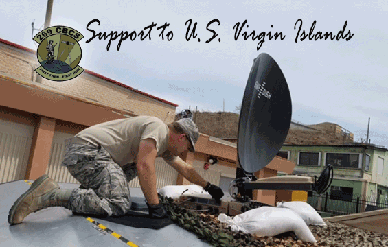 Soldier adjusts the configuration of a satellite dish in Virgin Islands.