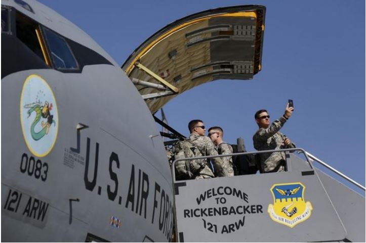 Ohio National Guard members board KC-135.
