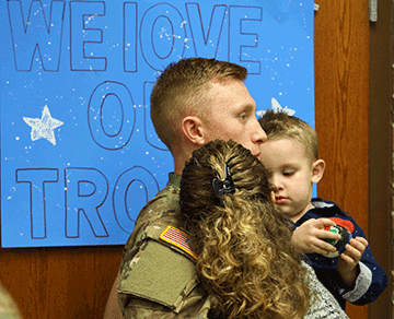 

A Soldier spends time with his Family after the ceremony.

A Soldier spends time with his Family after the ceremony.

