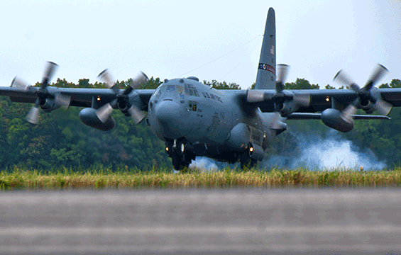 A C-130H Hercules performs touch and go training maneuvers.
