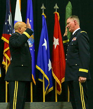 Maj. Gen. John C. Harris Jr. (left), Ohio assistant adjutant general for Army, administers the oath of office to newly promoted Brig. Gen. Steven E. Stivers.