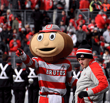 Brutus the Buckeye power points on the field.