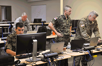 Ohio National Guard cyber specialists work with Serbian Armed Forces information technology specialists .