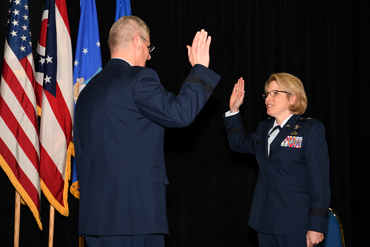 OOconner takes oath from Maj. Gen Mark E. Bartman.