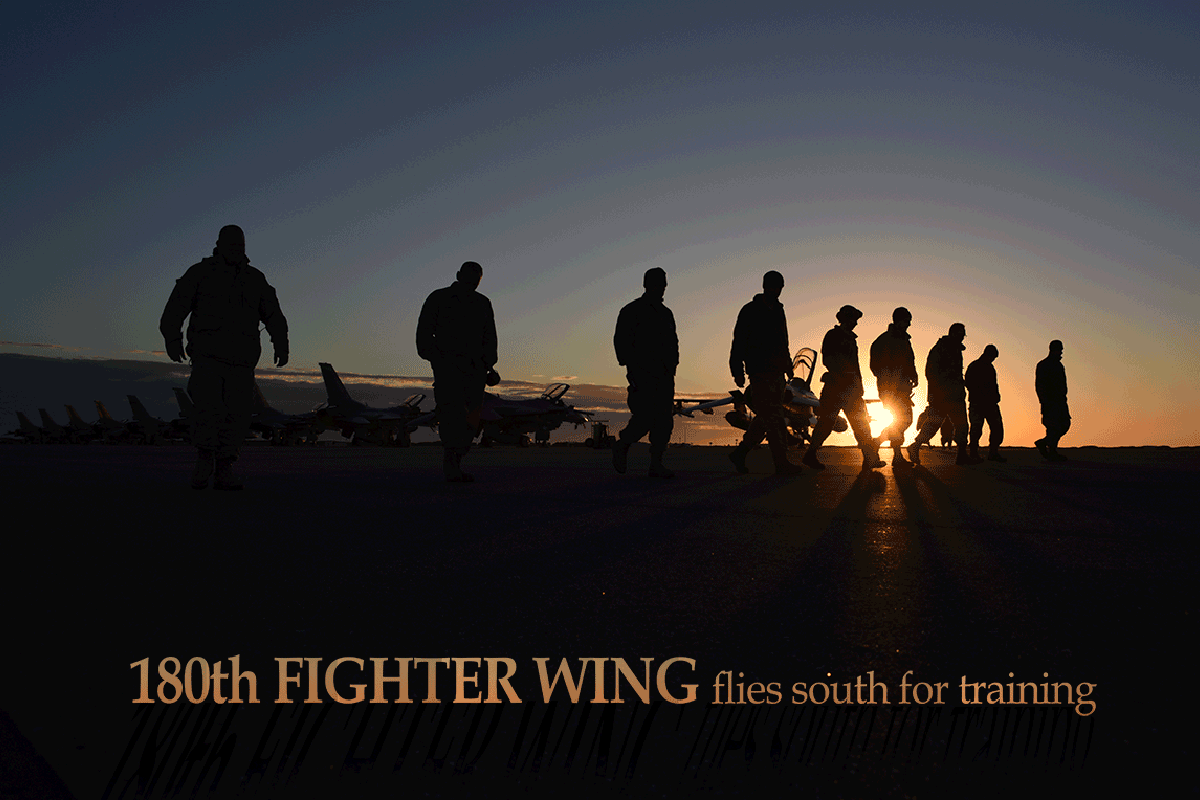 Silhouette of airmen scanning tarmack at sunrise with F-16s in background. 180th Fighter Wing flies south for training