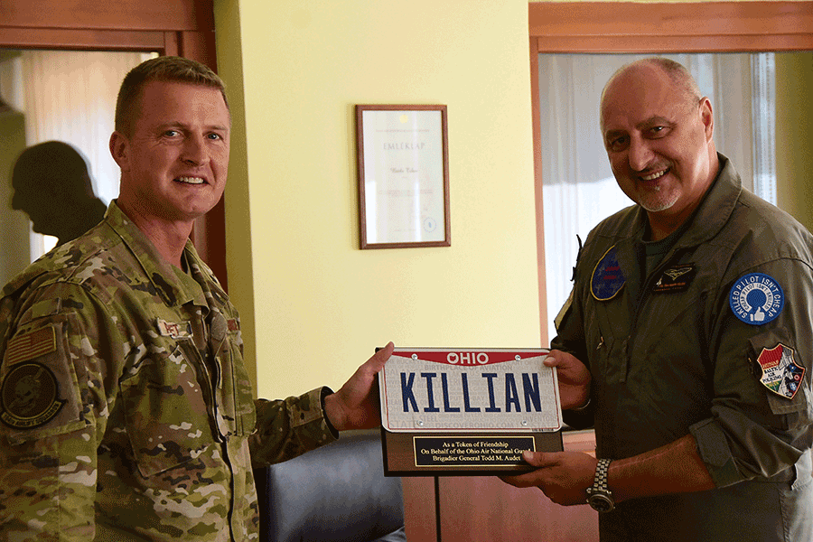 Hungarian Brig. Gen. Nándor Kilián presents a gift to U.S. Air Force Brig. Gen. Todd Audet.