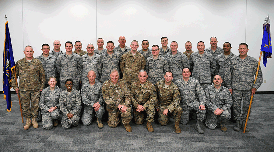 Airmen pose for group photo.