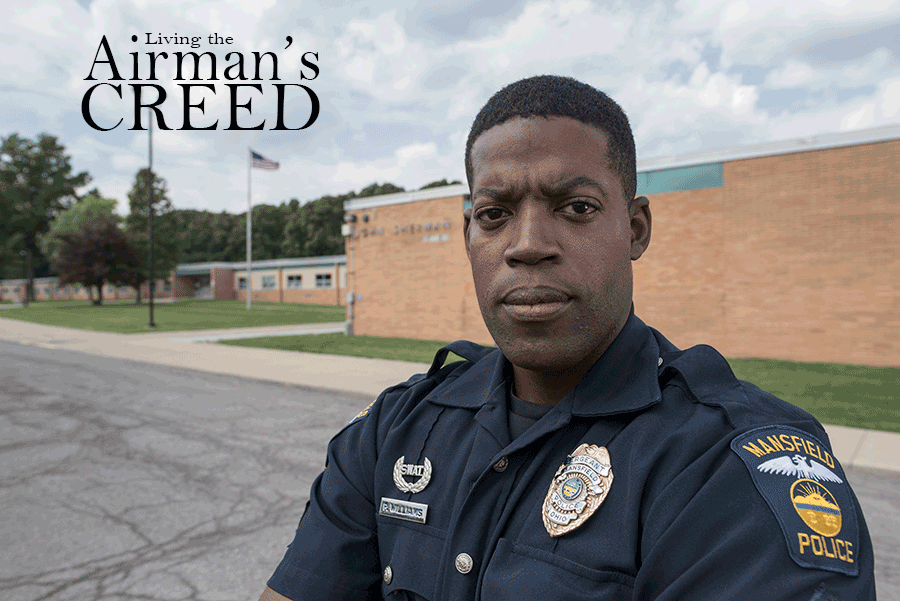 Staff Sgt. Patrick Williams stands in uniform in front of school. Headline reads: Living the Airman's Creed.