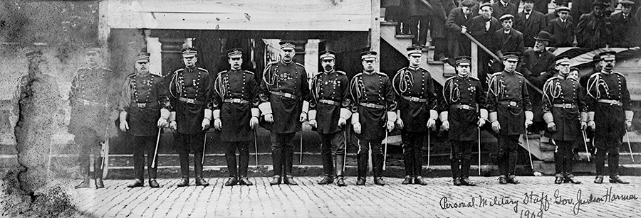 row of officers in black and whit e photo.