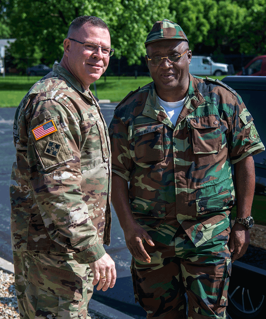 Commander and Col Shank stand for photo.