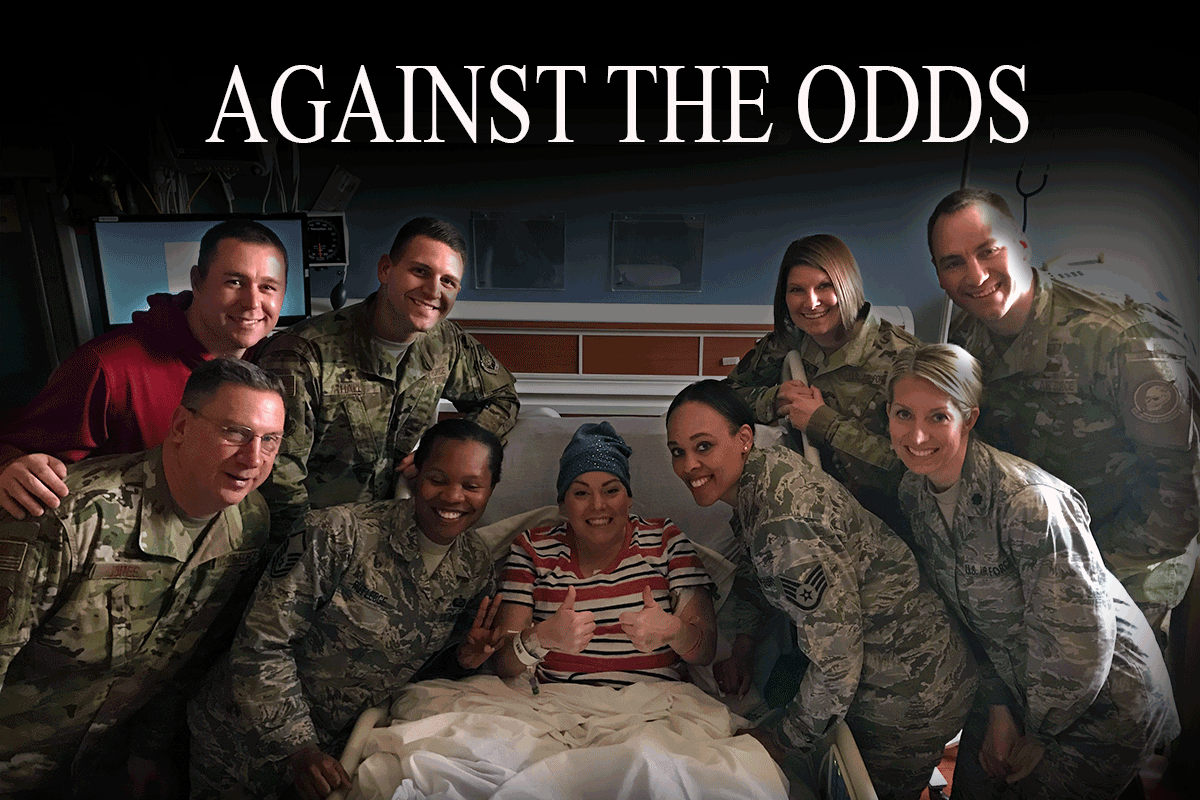 Airmen gather around Ortiz in her hospital bed. Headline reads: AGAINST THE ODDS