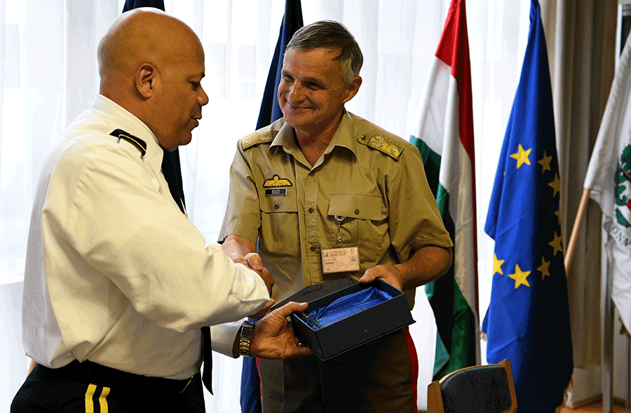 Brig. Gen. Tibor Bozó presents a gift to Maj. Gen. John C. Harris Jr.