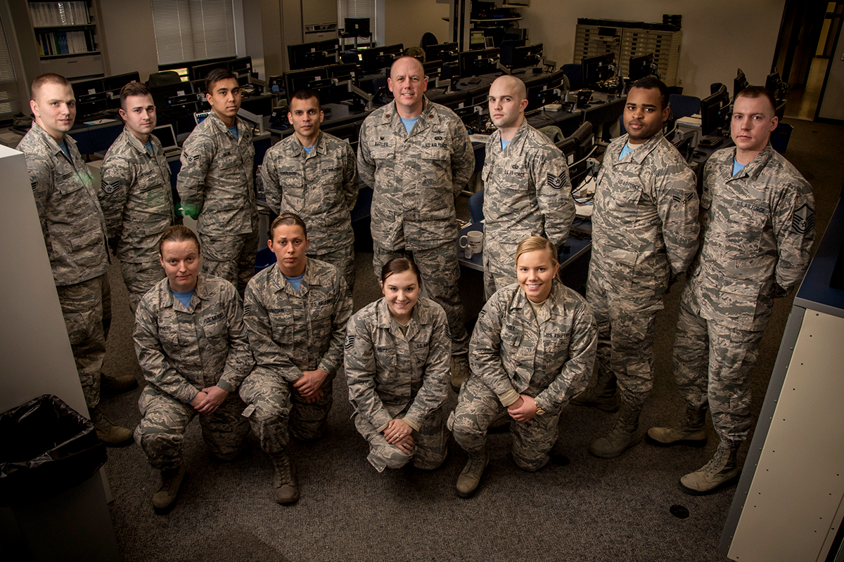 Group of Airmen in office.