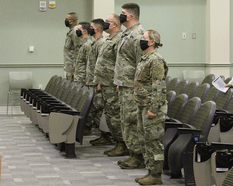 Soldier stand at attention.