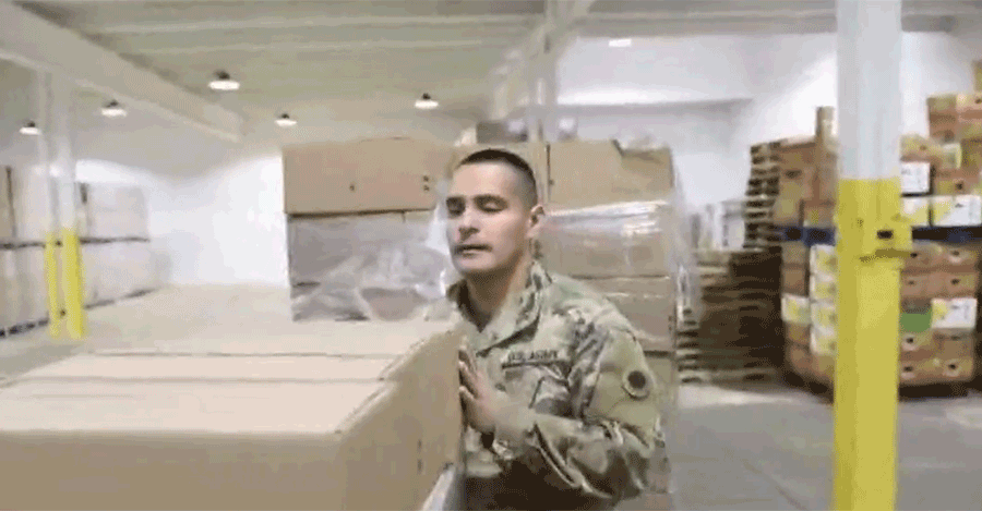 Soldier loading boxes