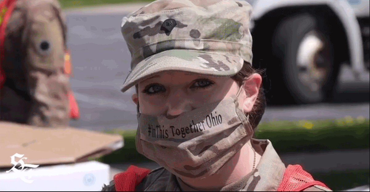 Female Soldier ewaring mask that says#InThisTogetherOhio