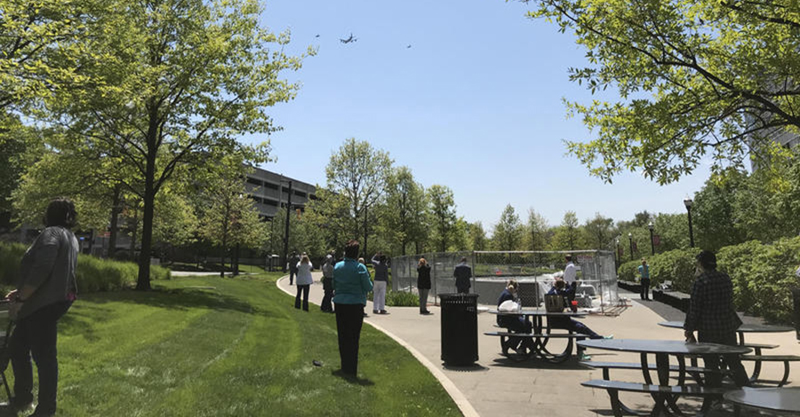 Two F-16s and a KC-135 with the 121st Air Refueling Wing of the Ohio National Guard conduct a flyby near the Wexner Medical Center.
 