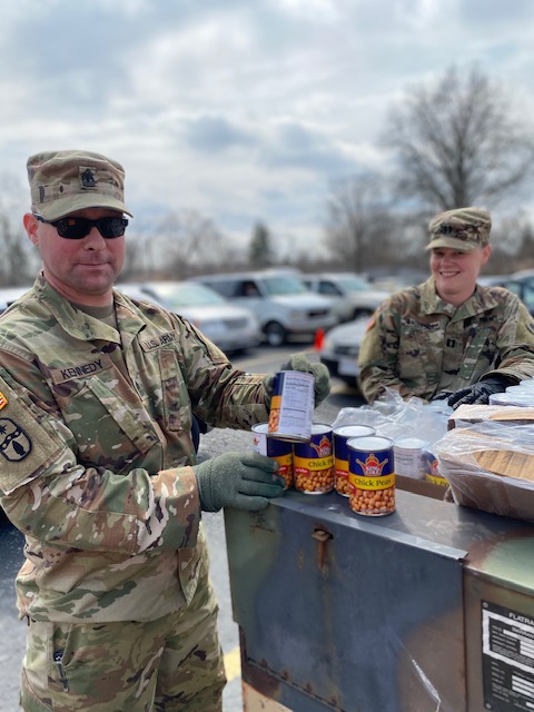 Soldier pulls canned goods.