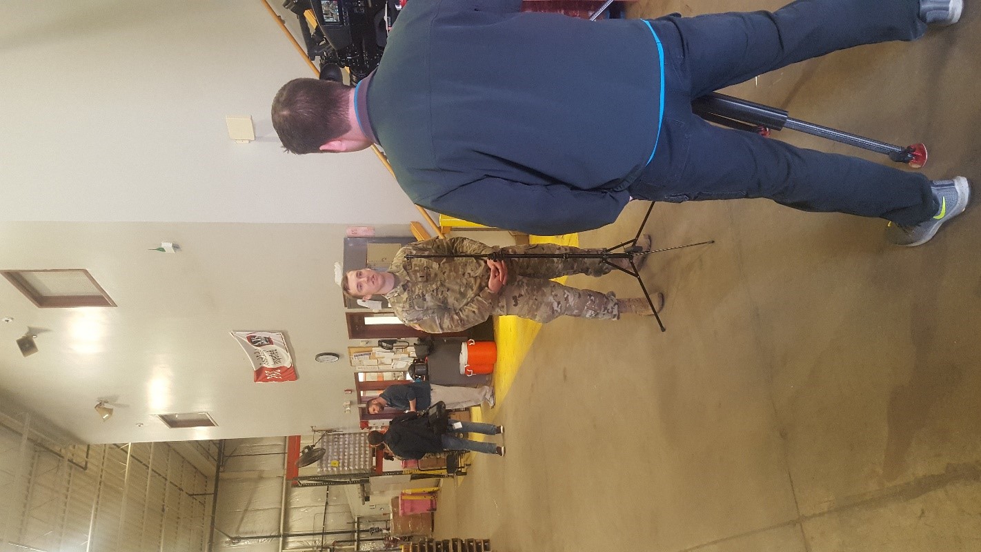 Soldier being interviewed.